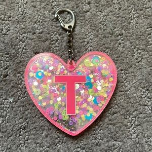 T key chain. Glitter moves. Great condition!